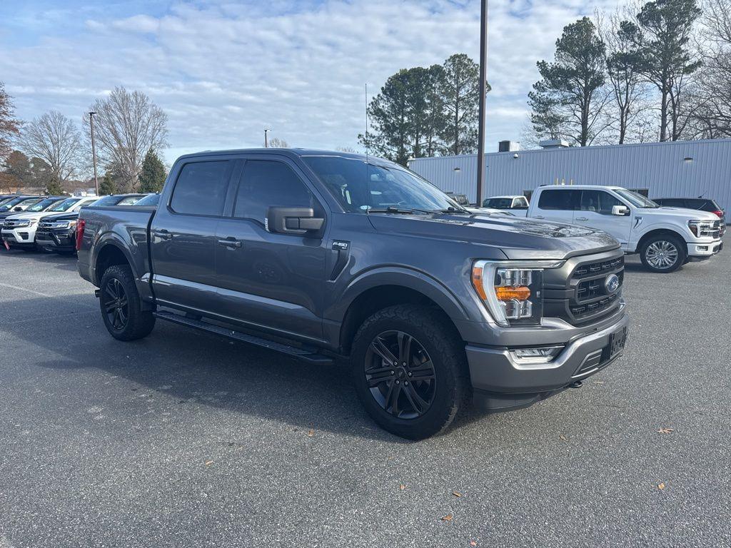 used 2021 Ford F-150 car, priced at $34,143