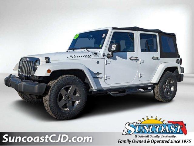 used 2015 Jeep Wrangler Unlimited car, priced at $19,139