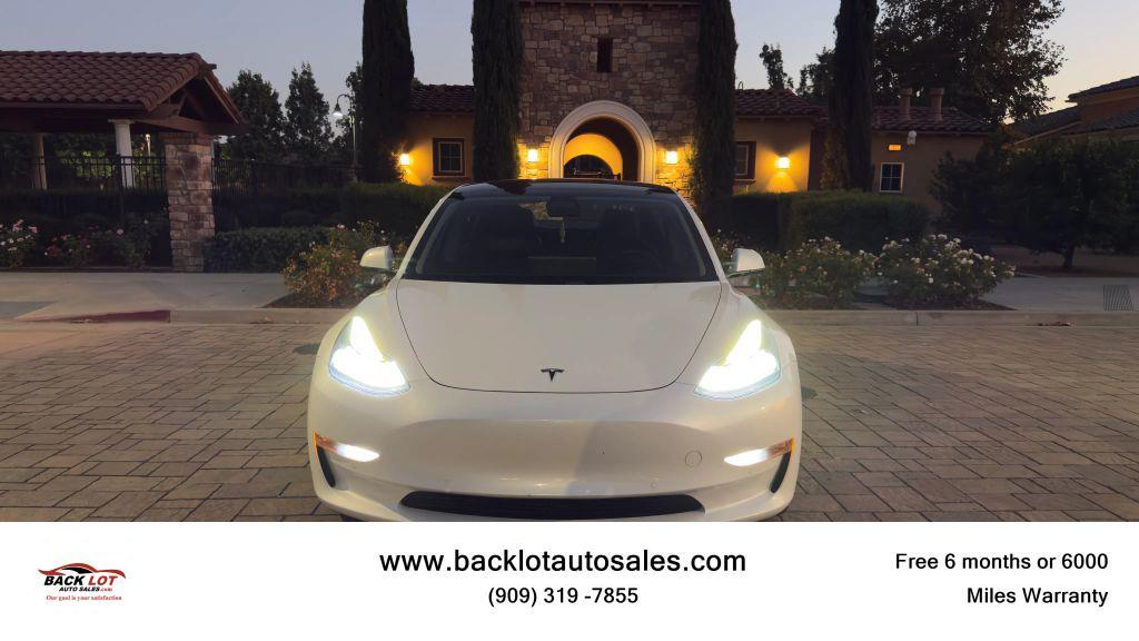 used 2021 Tesla Model 3 car, priced at $17,500