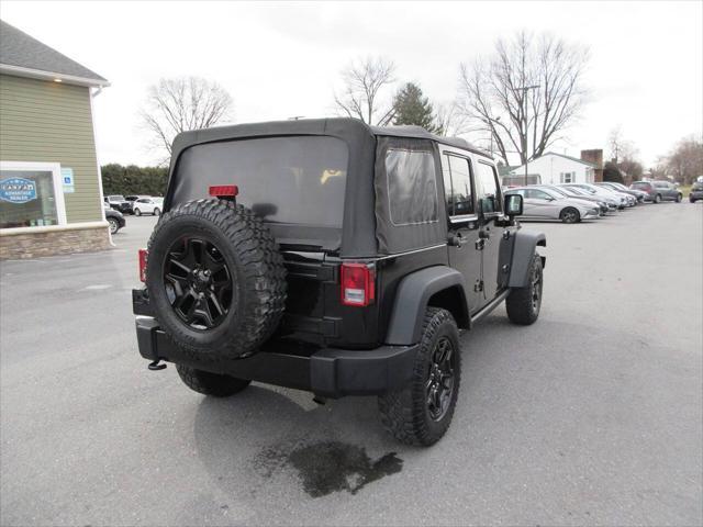 used 2014 Jeep Wrangler Unlimited car, priced at $13,900