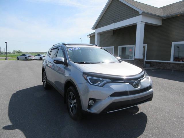 used 2018 Toyota RAV4 car, priced at $13,990