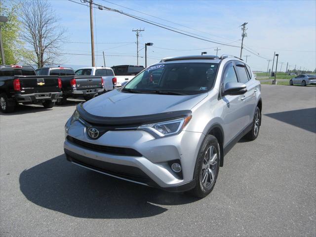 used 2018 Toyota RAV4 car, priced at $13,990