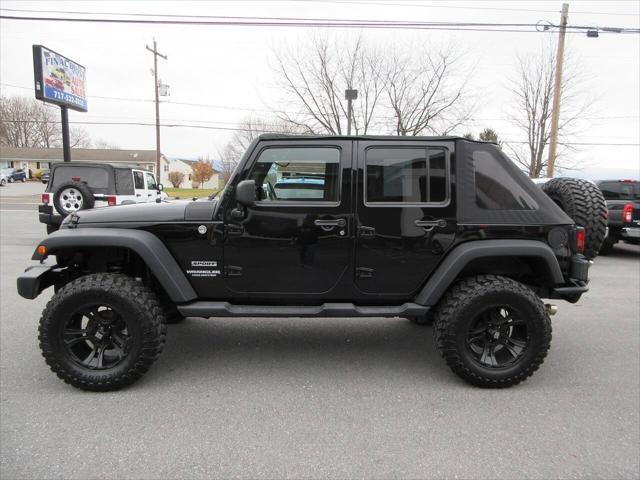 used 2011 Jeep Wrangler Unlimited car, priced at $12,100