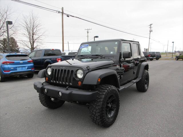 used 2011 Jeep Wrangler Unlimited car, priced at $12,100