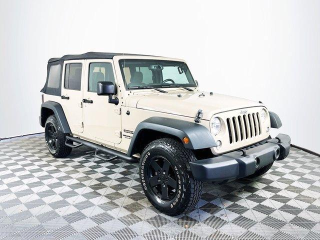 used 2016 Jeep Wrangler Unlimited car, priced at $23,052