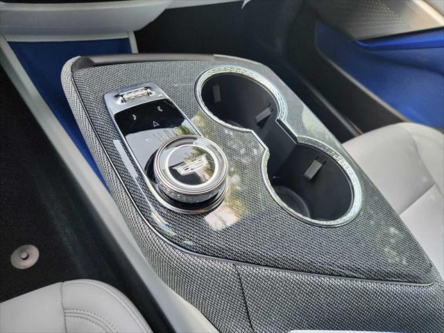 new 2025 Cadillac OPTIQ car, priced at $55,990