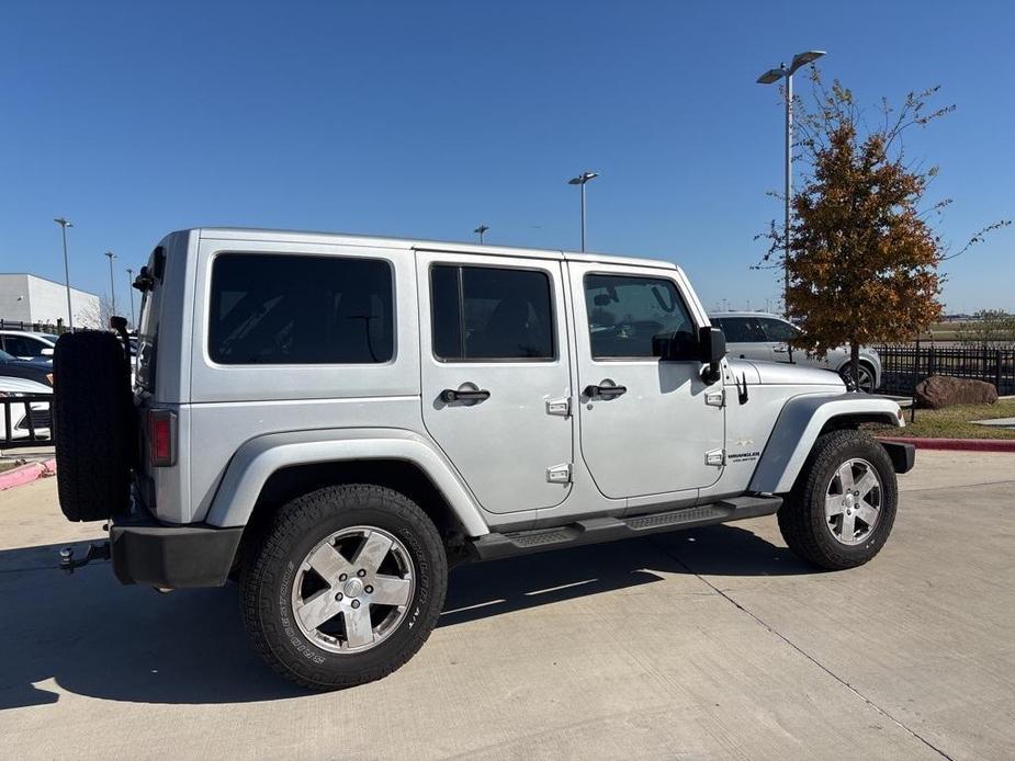 used 2011 Jeep Wrangler Unlimited car, priced at $12,500