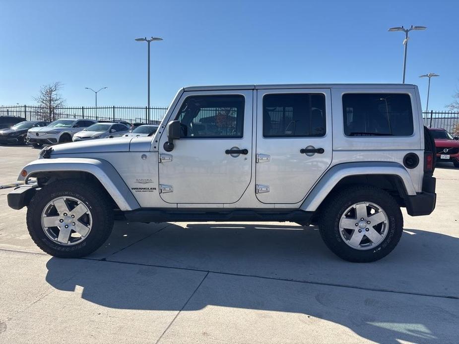 used 2011 Jeep Wrangler Unlimited car, priced at $12,500