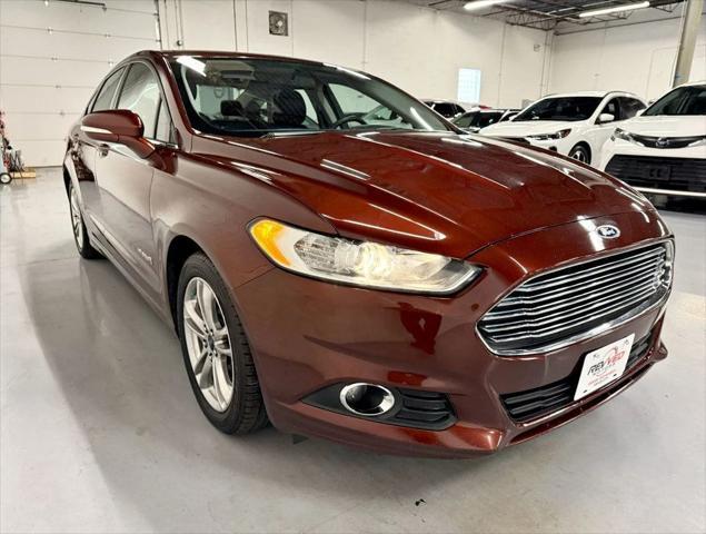 used 2016 Ford Fusion Hybrid car, priced at $9,950