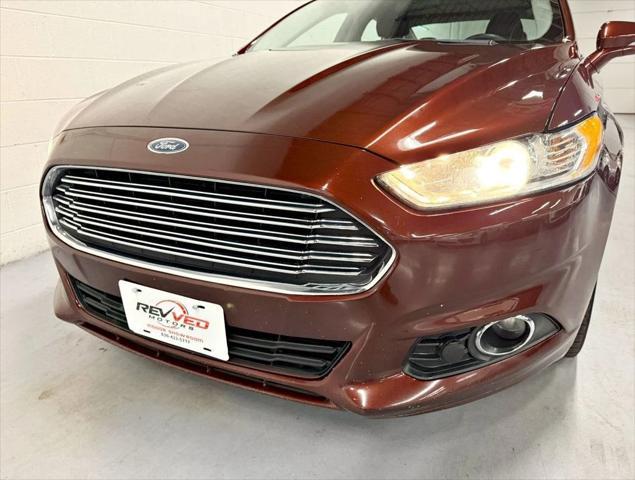 used 2016 Ford Fusion Hybrid car, priced at $9,950