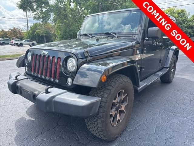 used 2015 Jeep Wrangler Unlimited car, priced at $15,250