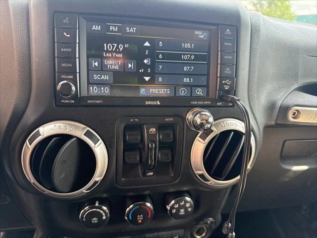 used 2015 Jeep Wrangler Unlimited car, priced at $15,250