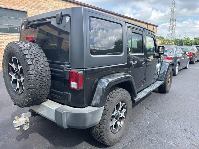 used 2015 Jeep Wrangler Unlimited car, priced at $15,250