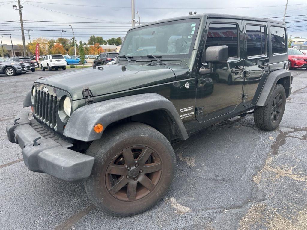used 2011 Jeep Wrangler Unlimited car, priced at $9,500
