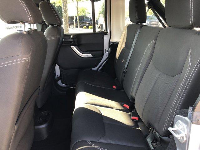 used 2015 Jeep Wrangler Unlimited car, priced at $17,477
