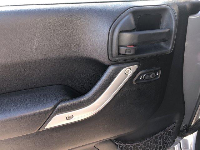 used 2015 Jeep Wrangler Unlimited car, priced at $17,477