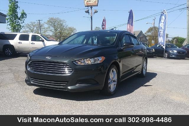 used 2016 Ford Fusion car, priced at $17,990