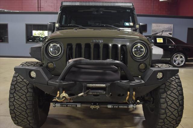 used 2016 Jeep Wrangler Unlimited car, priced at $26,990