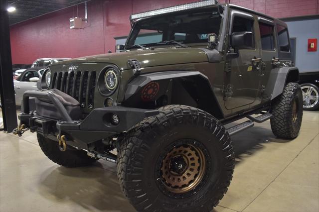 used 2016 Jeep Wrangler Unlimited car, priced at $26,990