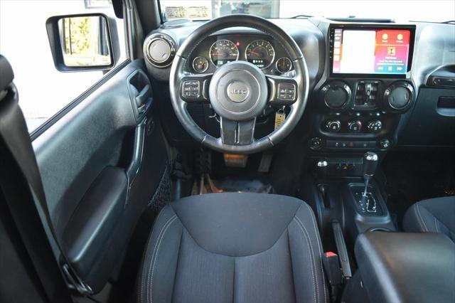 used 2016 Jeep Wrangler Unlimited car, priced at $26,990