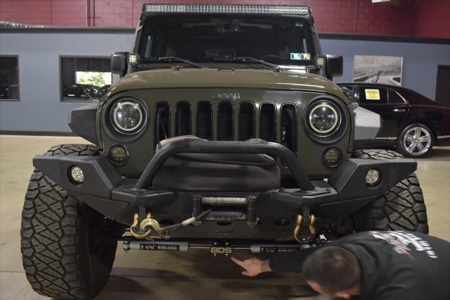 used 2016 Jeep Wrangler Unlimited car, priced at $26,990