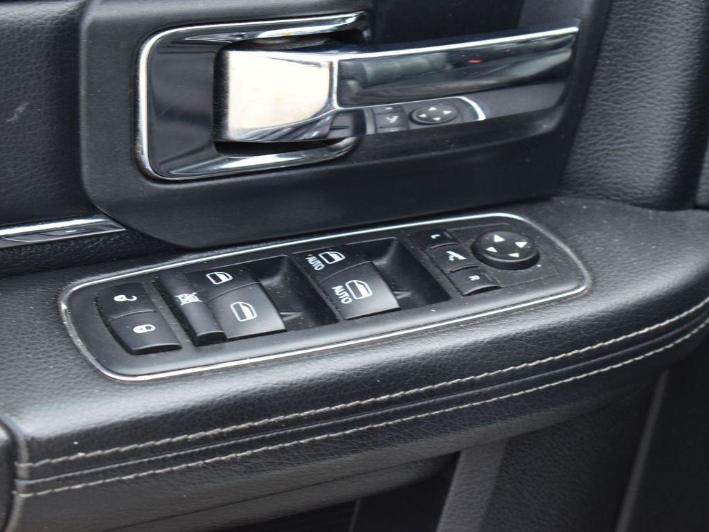 used 2018 Ram 1500 car, priced at $23,999