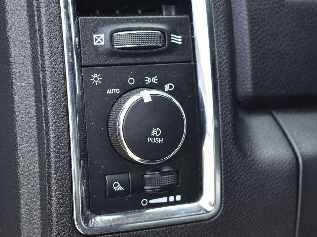 used 2018 Ram 1500 car, priced at $23,999