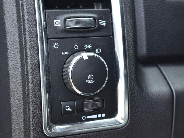 used 2018 Ram 1500 car, priced at $24,304