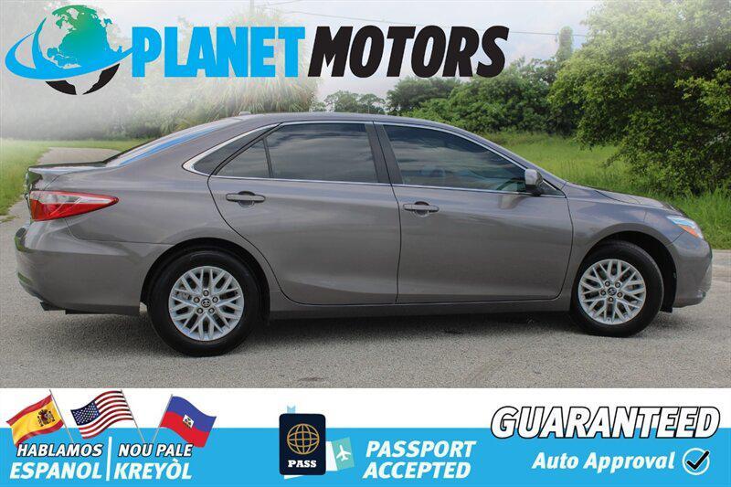 used 2014 Toyota Camry car, priced at $9,899