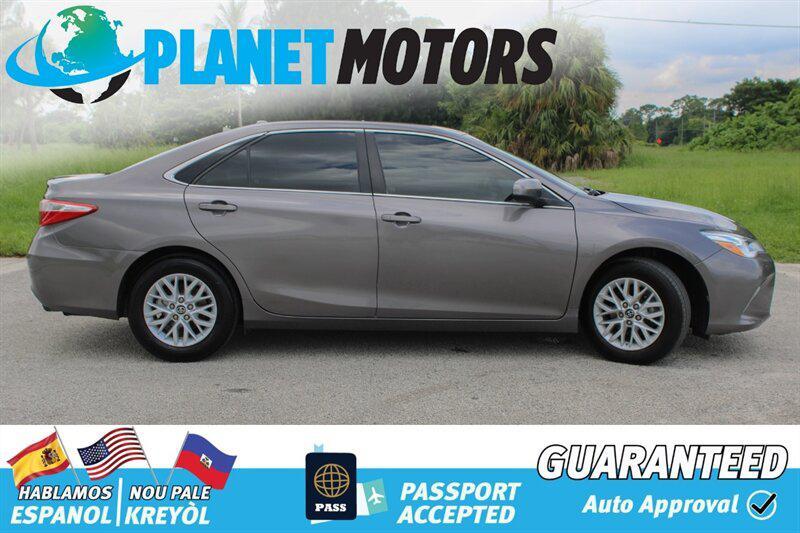 used 2014 Toyota Camry car, priced at $9,899