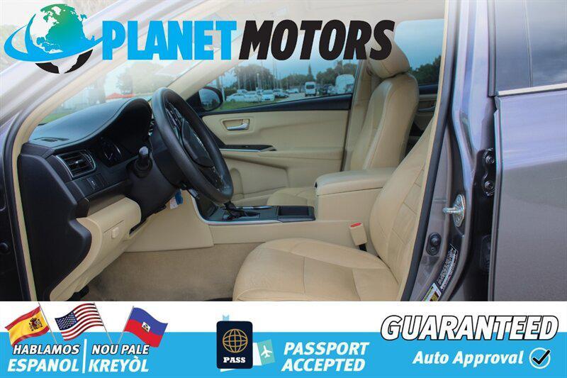 used 2014 Toyota Camry car, priced at $9,899