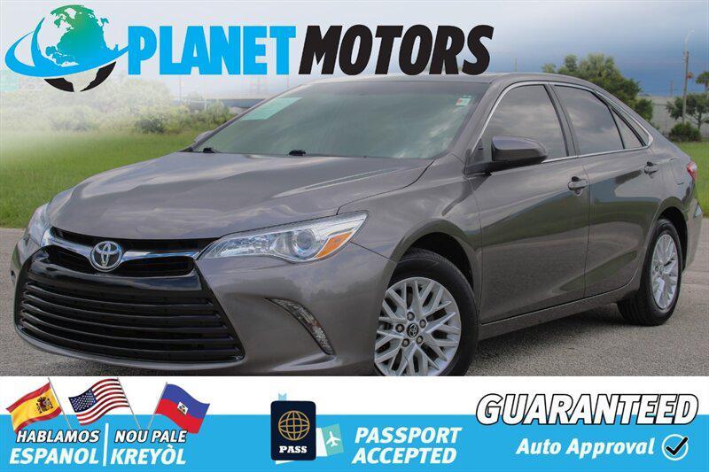 used 2014 Toyota Camry car, priced at $9,899