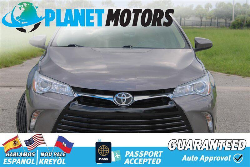 used 2014 Toyota Camry car, priced at $9,899