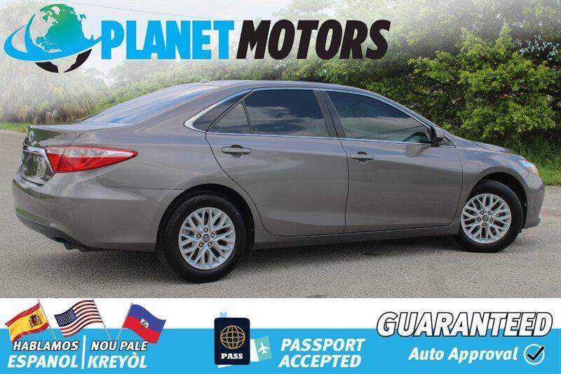 used 2014 Toyota Camry car, priced at $9,899