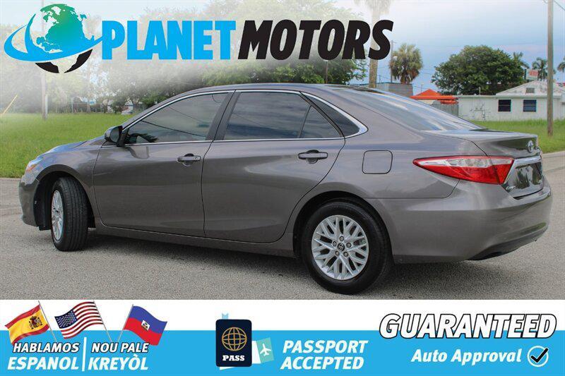 used 2014 Toyota Camry car, priced at $9,899
