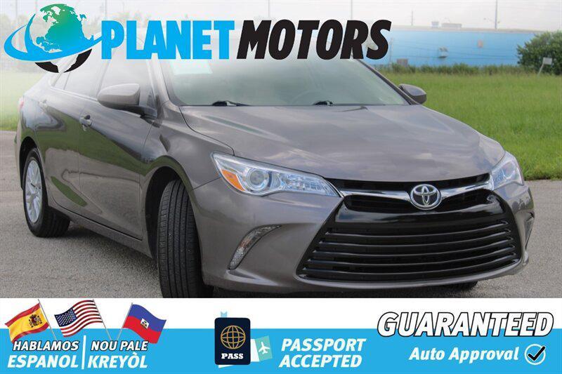 used 2014 Toyota Camry car, priced at $9,899