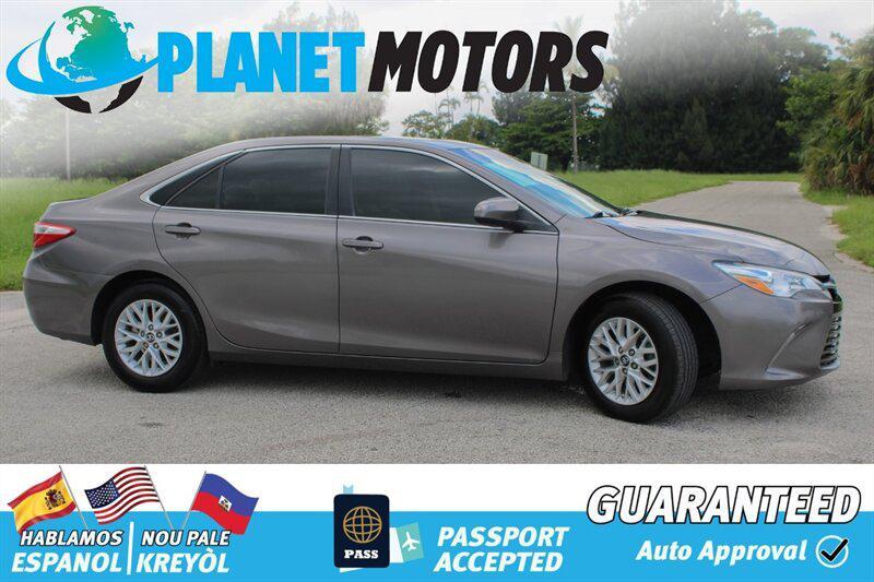 used 2014 Toyota Camry car, priced at $9,899