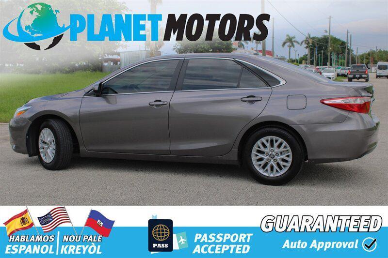 used 2014 Toyota Camry car, priced at $9,899