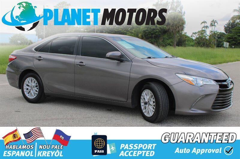 used 2014 Toyota Camry car, priced at $9,899