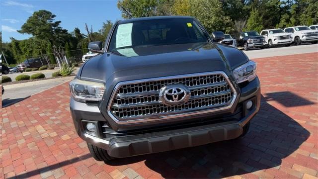 used 2016 Toyota Tacoma car, priced at $30,903