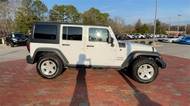 used 2017 Jeep Wrangler Unlimited car, priced at $26,661