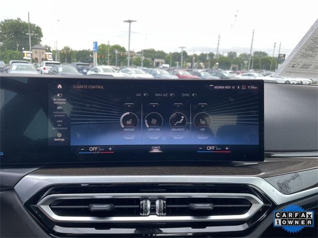 used 2023 BMW 330e car, priced at $36,826