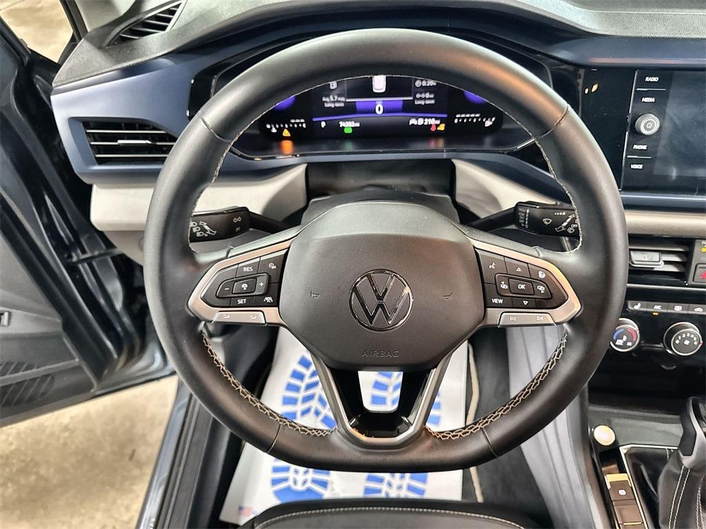 used 2023 Volkswagen Taos car, priced at $18,257