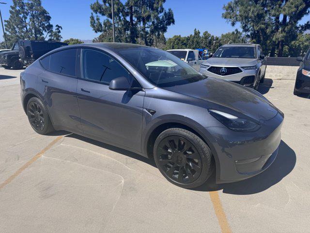 used 2023 Tesla Model Y car, priced at $27,950