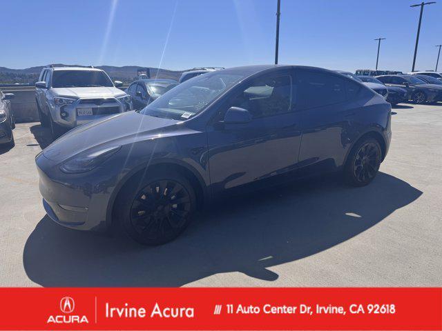 used 2023 Tesla Model Y car, priced at $27,950