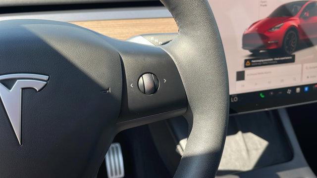 used 2023 Tesla Model Y car, priced at $33,375
