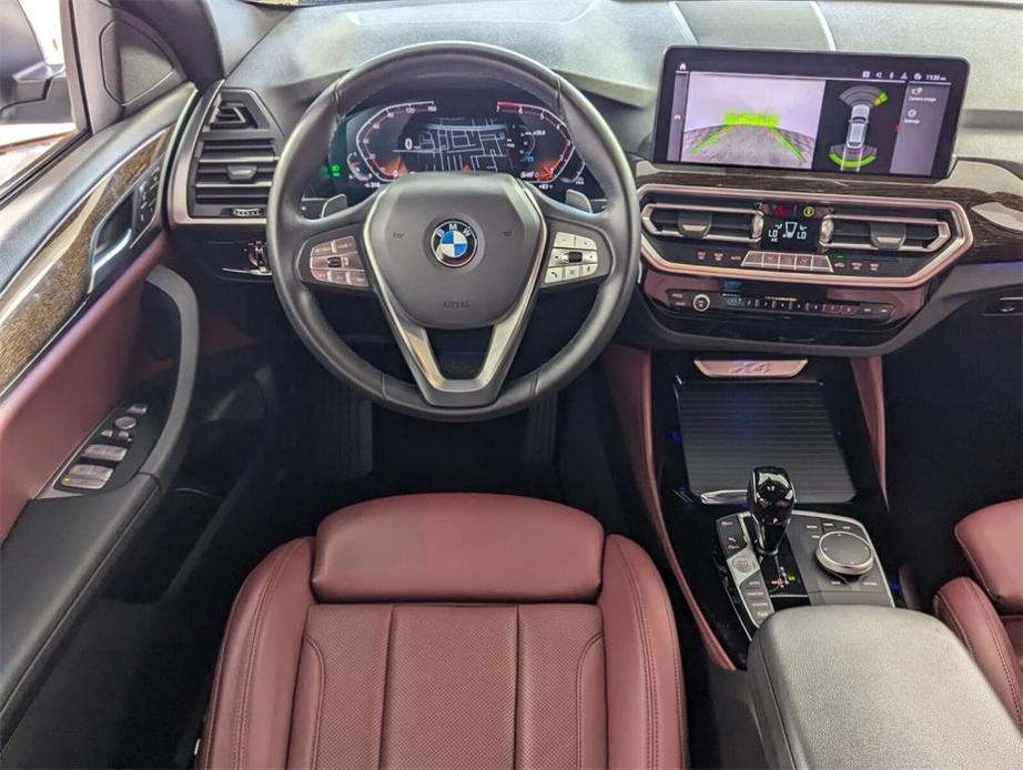 used 2023 BMW X4 car, priced at $42,248