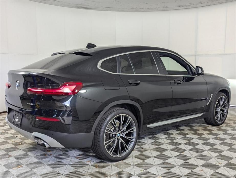 used 2023 BMW X4 car, priced at $42,248