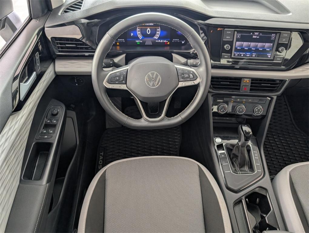 used 2024 Volkswagen Taos car, priced at $18,000