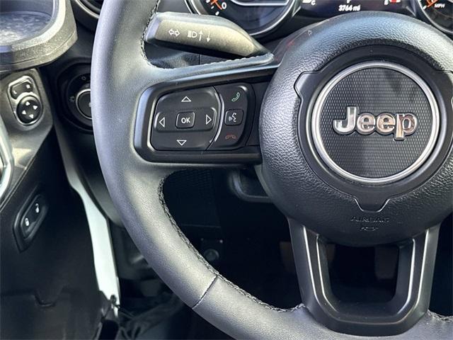 used 2023 Jeep Wrangler car, priced at $47,680